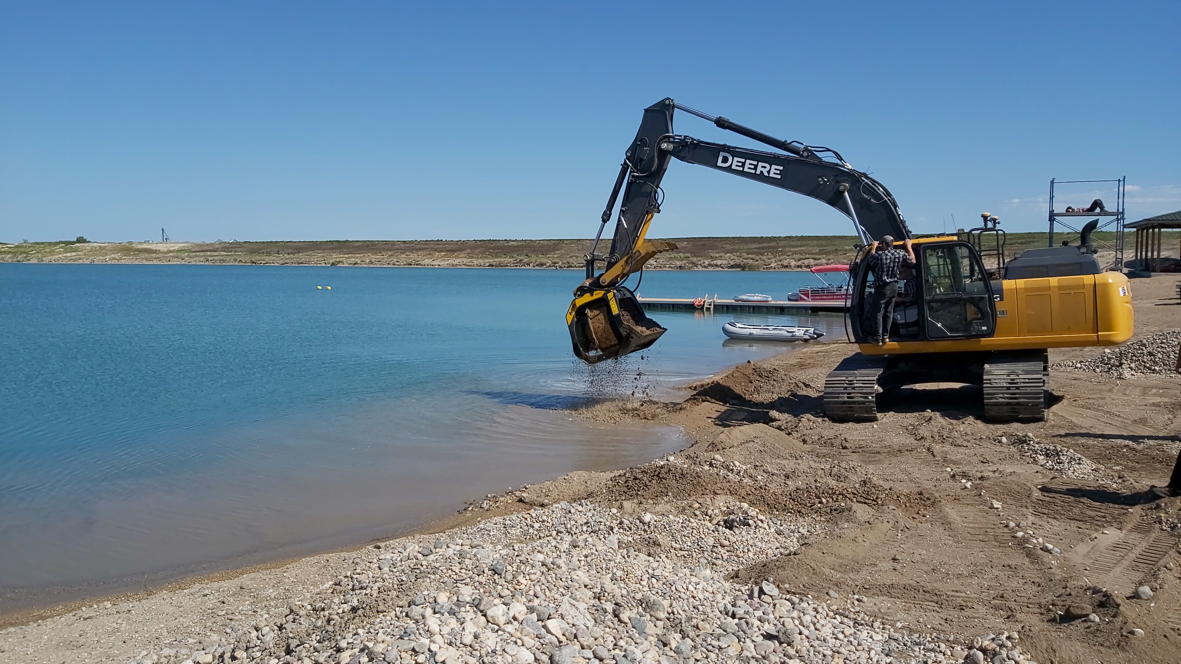 Oak Bluff Colony Farms and MB Crusher working cooperatively