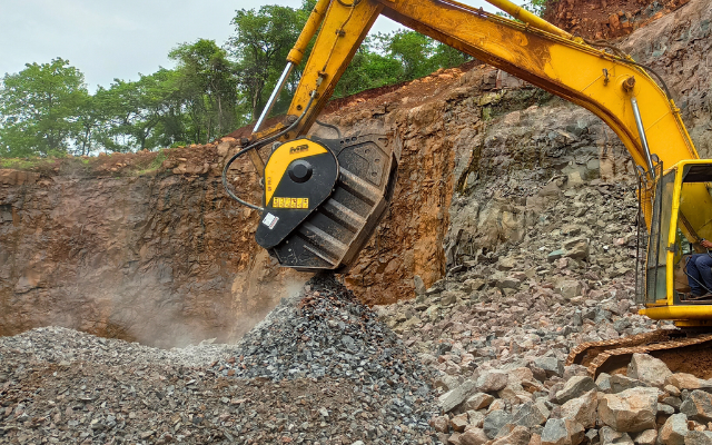 • Basalt rocks before and after processing with MB Crusher's bucket crusher for cost-saving road base filling.