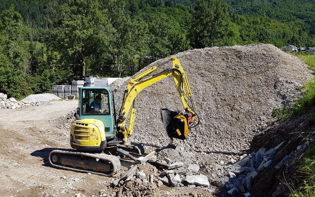 An MB-C50 crusher bucket at work in a natural park in Slovenia