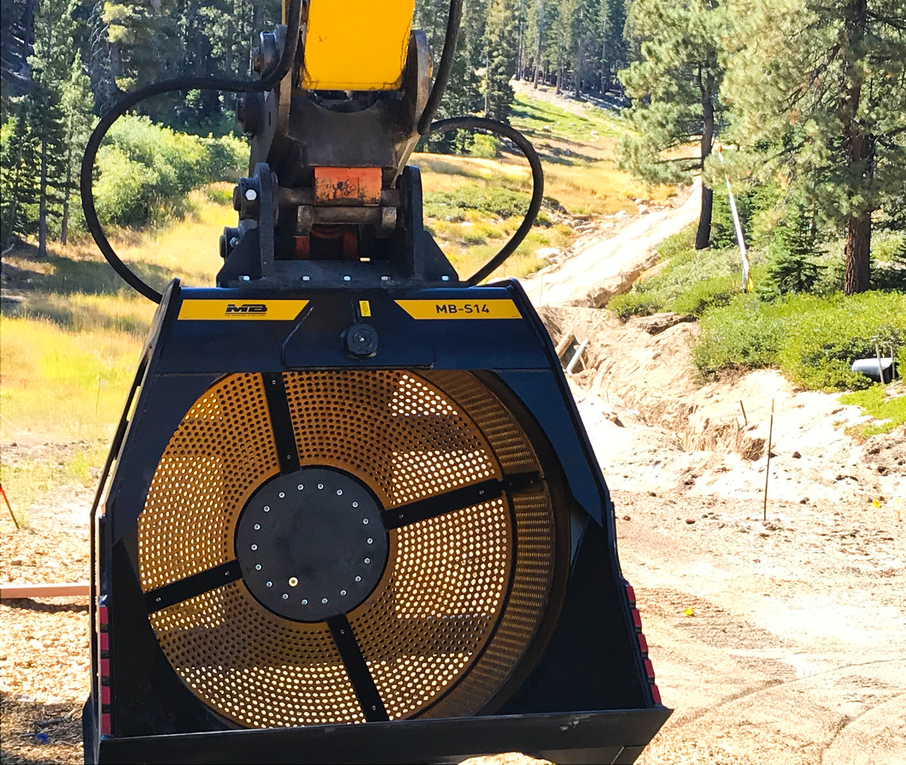 MB-S14 Screener bucket working on a ski resort in Heavenly Mountain
