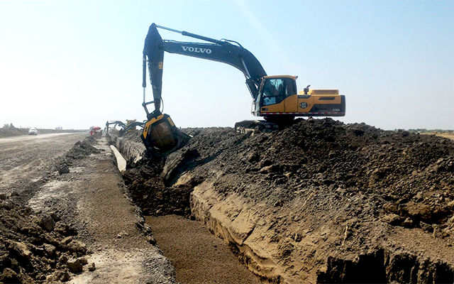 Azerbaijan: An MB-S18 screening bucket installed on a Volvo Excavator separating material to create fill