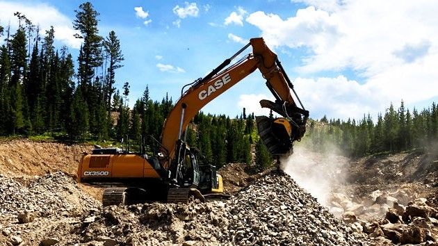 A crusher bucket BF120.4 crushing erratics from glaciers to produce aggregate for road construction and structural fill