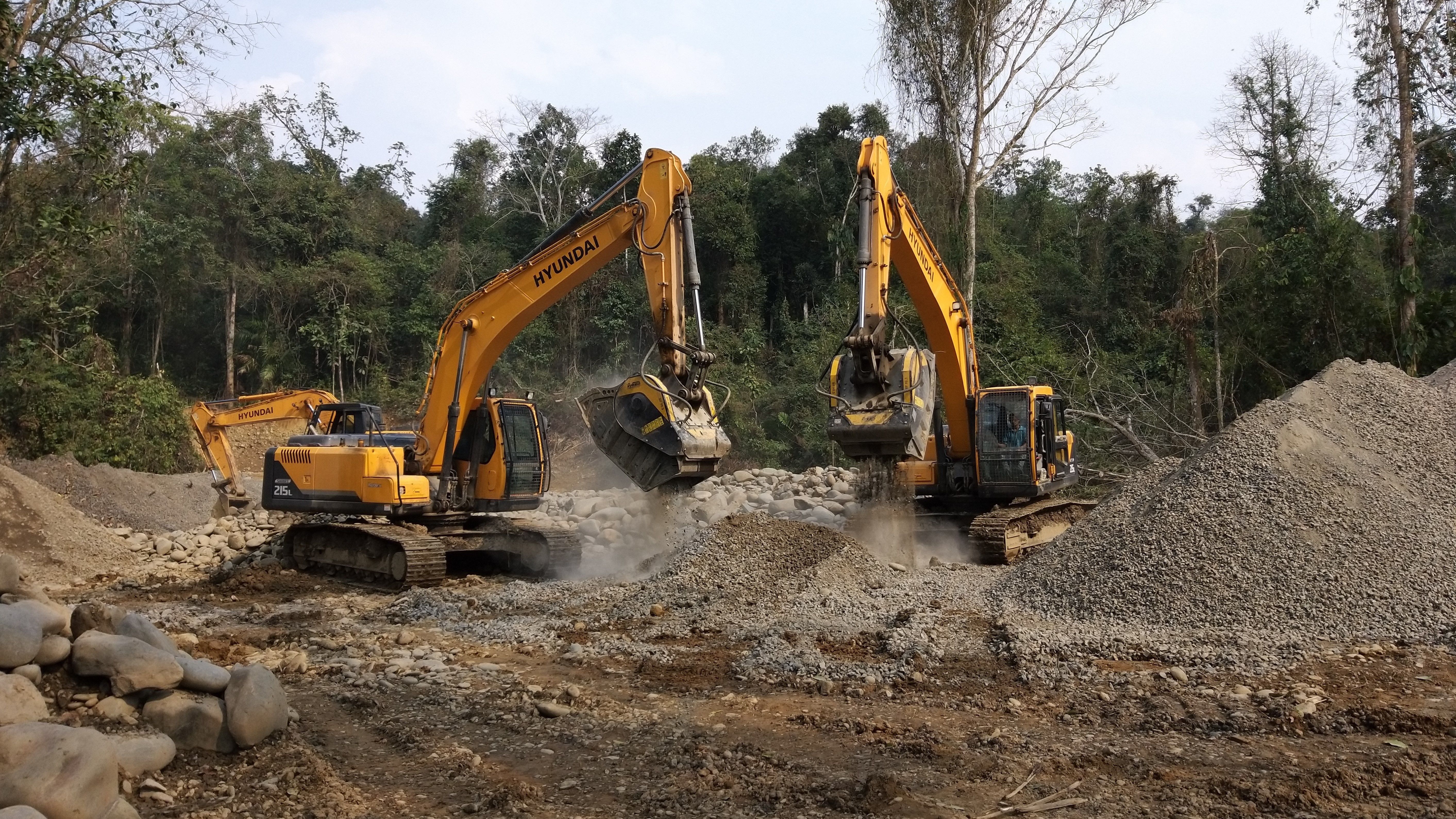 MB-S18 screening bucket and the BF90.3 crusher bucket attached to an excavator and backhoe loader