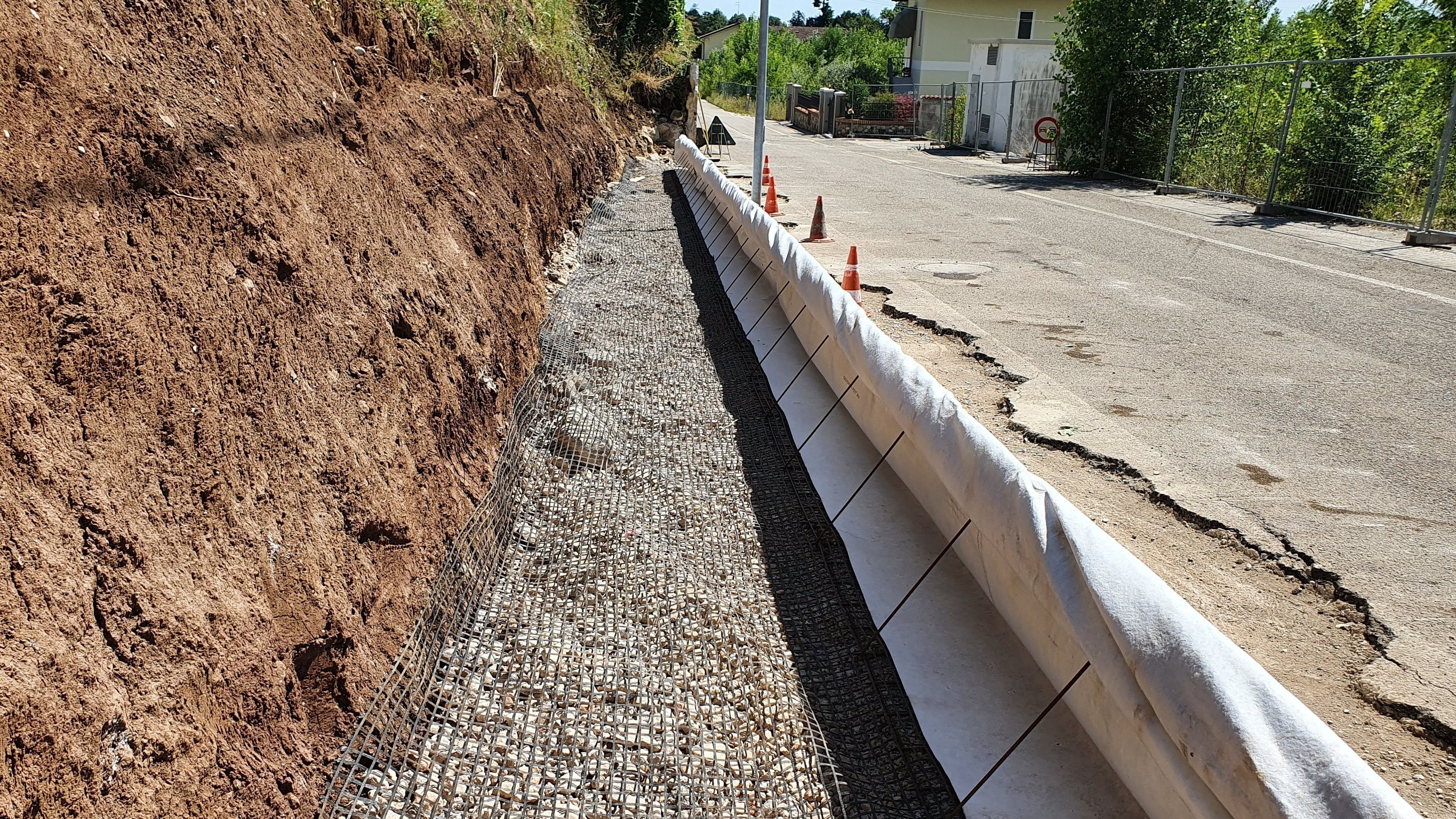 WORK: CONSTRUCTING A ROAD EMBANKMENT 