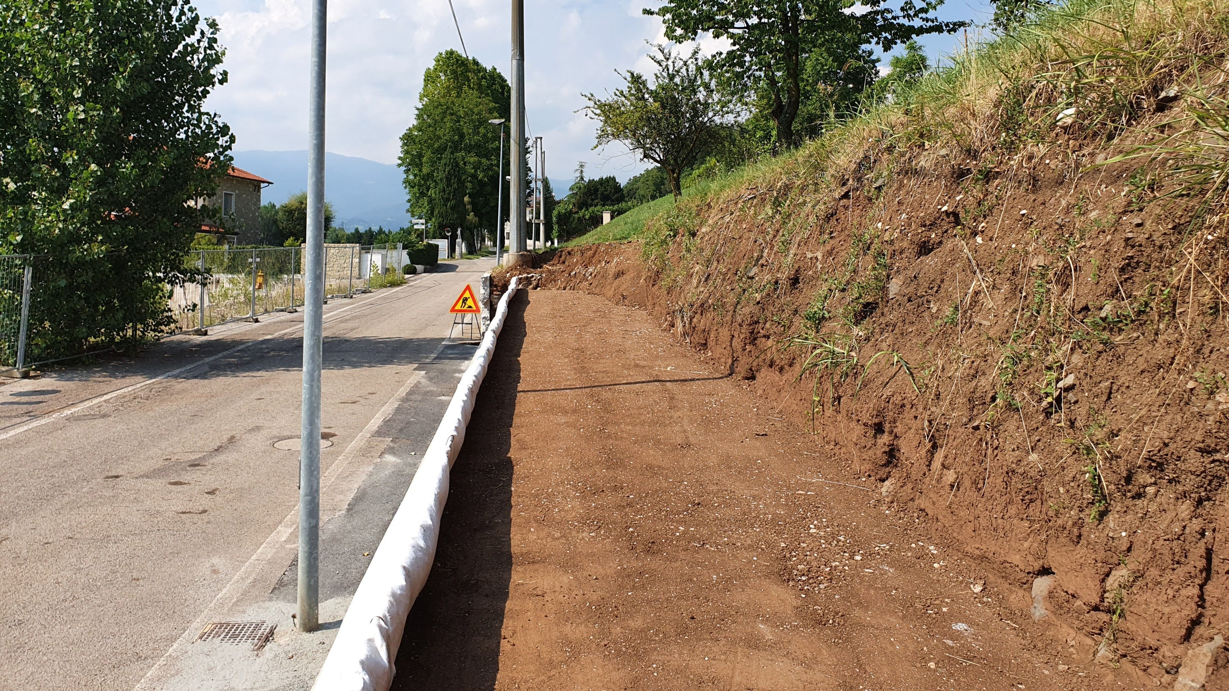 WORK: CONSTRUCTING A ROAD EMBANKMENT 