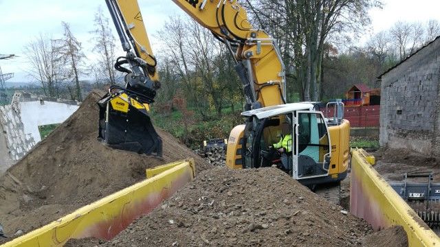 SOIL MIXED WITH DEBRIS