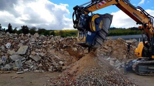 with MB’s crusher bucket, you can process material down to your desired output size so you can immediately reuse it.
